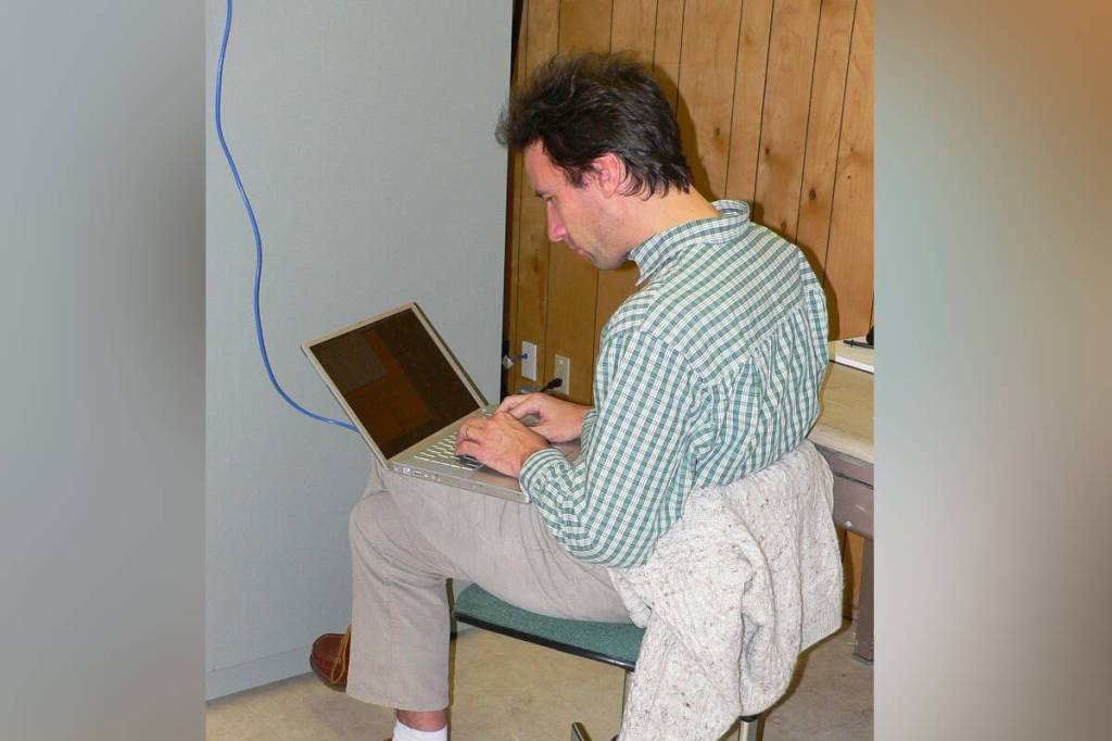 Chief innovation and technology officer at Ocean Networks Canada (ONC), Benoît Pirenne, working to prepare the shore station for the VENUS Saanich Inlet observatory on Feb. 2, 2006. (Courtesy of Ocean Networks Canada)
